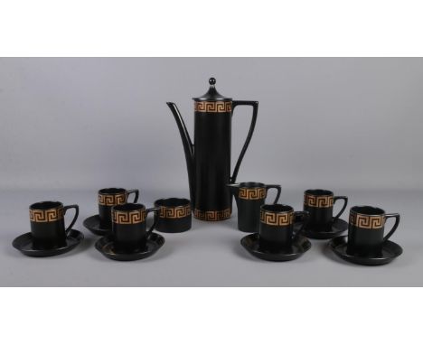 A Portmerion 'Greek Key' coffee service, designed by Susan Williams-Ellis. Comprising of six cups and saucers, tea pot sugar 