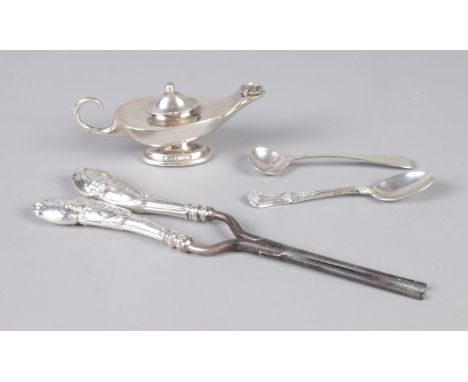 A collection of silver to include lamp style table lighter, spoons and pair of silver handled glove stretchers. Hallmarks var