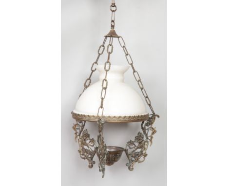 A hanging opaque glass ceiling light with metal floral mounts.  