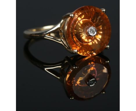 A 10ct Gold Citrine and Diamond taurus ring, by Lehrer. Size NÂ½. Total weight: 3.0g  