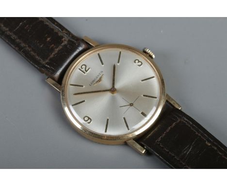 A Gents 9ct Gold Longines manual wristwatch, with quarterly numeral and baton markers, with subsidiary second dial. Stamped 3