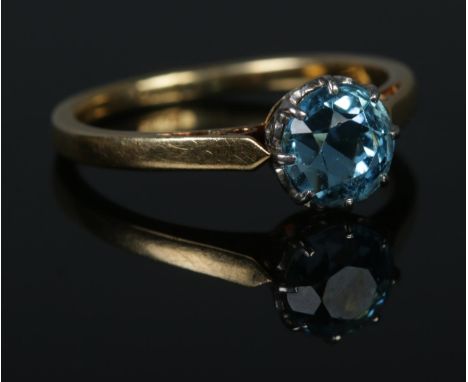 An antique 18ct Gold Aquamarine solitaire ring. Diameter of stone: 6mm. Size M. Total weight: 2.5g.  