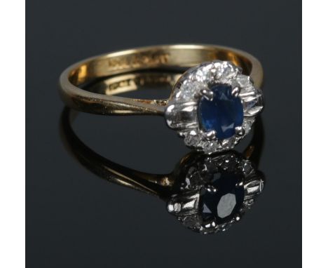 An art deco 18ct Gold and Platinum Sapphire and Diamond cluster ring. Size LÂ½. Total weight: 2.8g.  