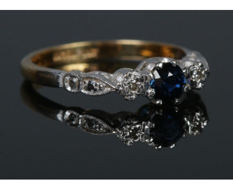 A mid twentieth century 18ct Gold and Platinum Sapphire and Diamond ring. Size NÂ½. Total weight: 3.0g  