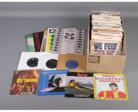 A box of vinyl single records of mainly pop and rock examples to include Elvis Presley, The Rolling Stones, Michael Jackson, 