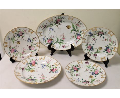 Five pieces of 19th century Paris porcelain dinnerware with polychrome and gilt floral decoration, some damages.  (5). Condit
