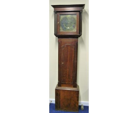 Thirty hour long case clock by Lawrie Carlisle with 12" square brass dial initialled and dated 1777 in oak case with fluted c