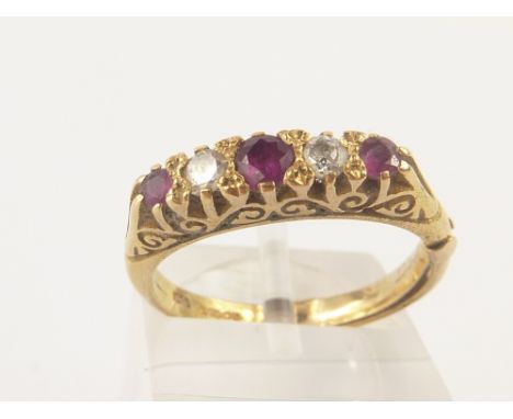 Diamond and ruby half hoop ring of Edwardian style in 18ct gold.  Size 'K'.
