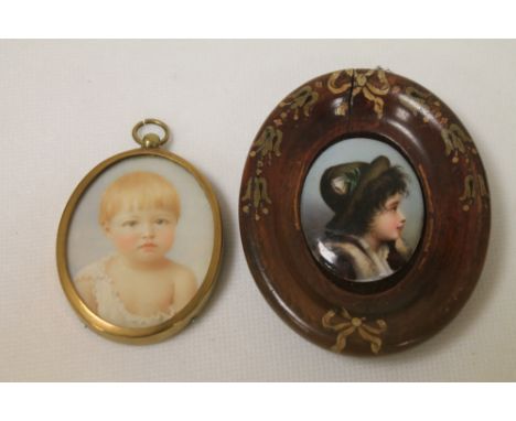 Small early 20th century portrait miniature of a baby, 5.5 x 4.5cm (oval); also a small porcelain plaque of a Tyrolean boy, 4
