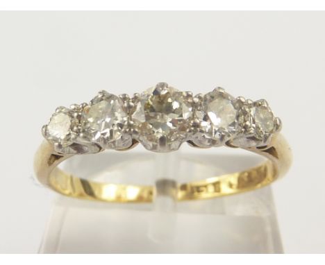 Diamond five stone ring with graduated brilliants '18ct Plat'.  Size 'K'    Condition Report.  Quite bright, typical old cut 