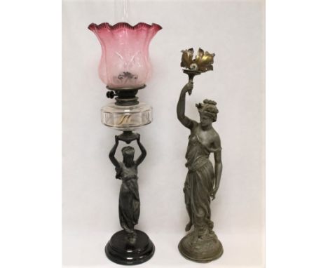 Victorian oil lamp, the faceted clear glass reservoir on spelter column in the form of a classical female figure on black pot