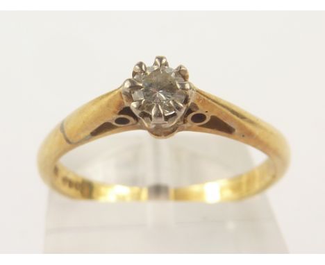 Diamond solitaire ring, the brilliant approximately .1ct in gold '.750'.Size 'K'.  