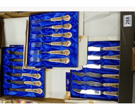 A collection of boxed Aynsley Orchard Gold themed knife and fork sets. (3).