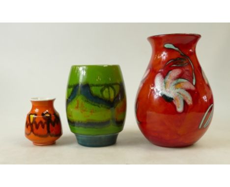 A collection of Poole Pottery vases to include mottled orange, green etc (height of tallest 21cm) (3)