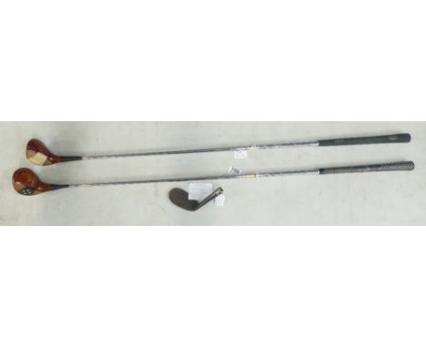 Two vintage WOODS golf clubs - Aldridge H B & S Pinseeker No.2 England, plus a N0.5 Scotland.  Wooden heads, steel shafts.Tog