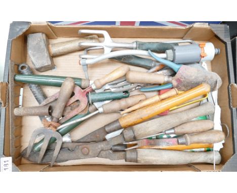 A mixed collection of hand held tools to include hammers, trowels, shears etc 