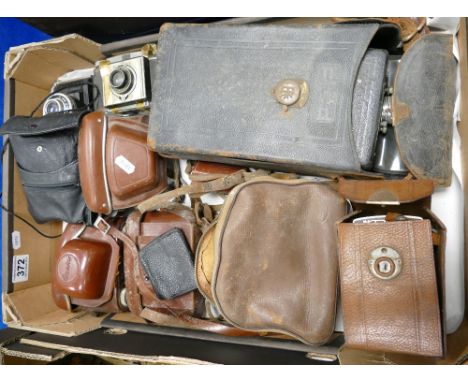 A mixed collection of vintage cameras including - TLR Cameras, Early Kodak branded Cine cameras, etc.