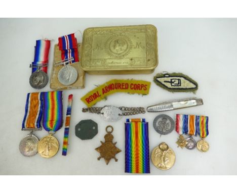 WWI Trio group of medals, pair of medals and silver discharge badge, together with dog tags, miniatures misc items including 