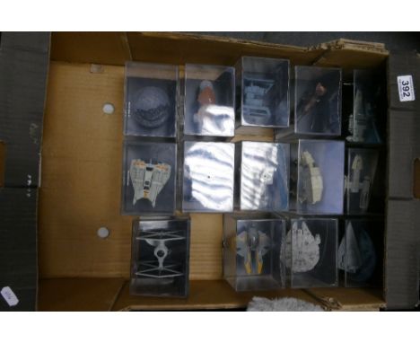 A collection of Lucas Films branded collectable Starwars cased spacecraft to include Millennium Falcon, Star Destroyer, Snow 