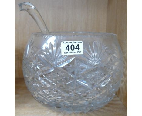 Large cut glass bowl together with a matching ladle 