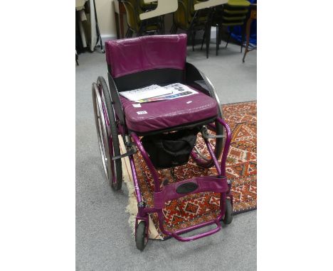 De Vinci leggers Ti extra light branded wheel chair, 19mm  tubing, fold down back rest, titanium push rims, leather upholster