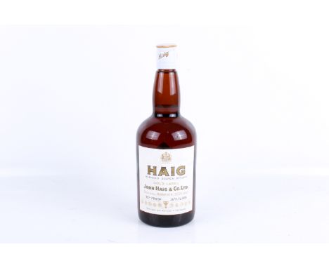 A bottle of John Haig & Co Gold label blended scotch whisky. 26.66 fl.ozs, 70 proof.