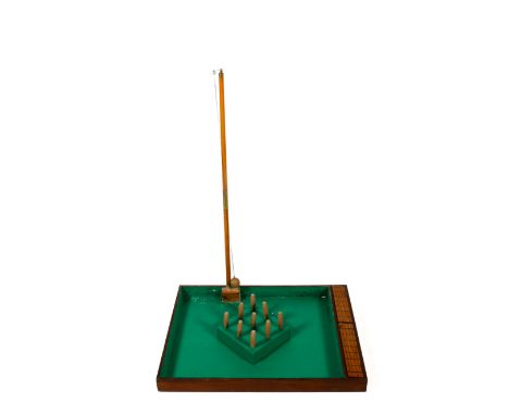 A vintage nine-pin table skittles game. Lined with green baize, with nine wood pins, post and ball, 61cm x 84cm.