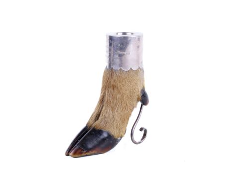 A silver mounted deer's foot match strike. The cylindrical mount engraved 'Devon & Somerset, Found Tabor Hill, Killed Leigh F