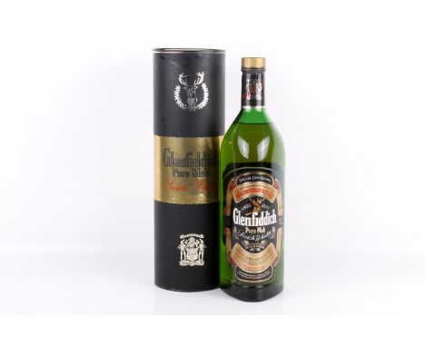 A bottle of Glenfiddich Pure Malt scotch Whisky. In original box, 1l, 43% vol.