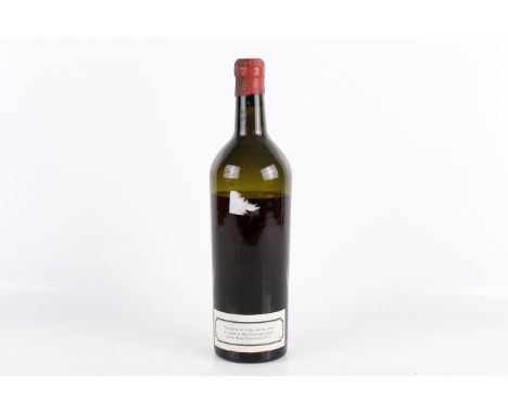 A part bottle of vintage red wine. Label missing, level below shoulder, waxed top printed CLARET. According to the accompanyi