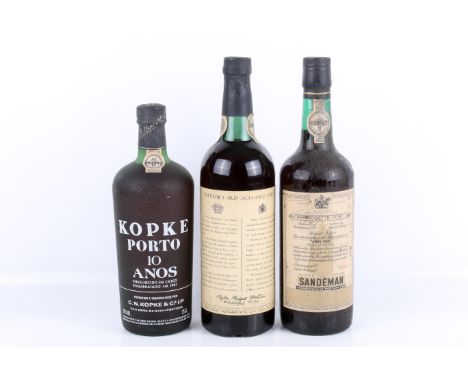 Three bottles of vintage port. Comprising Taylor's Old Alliance tawny port, number 655501, front label missing; Sandeman Ambr