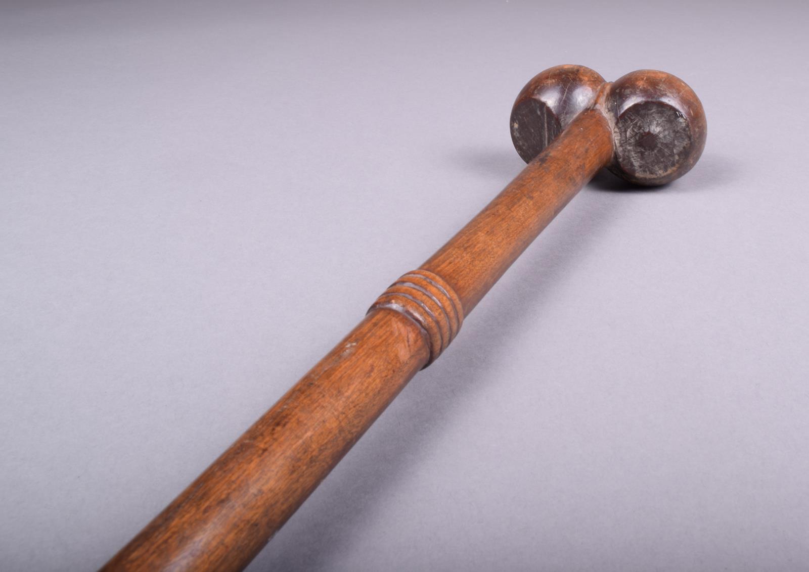 A South African knobkerrie, the shaft with a reeded band and a twin