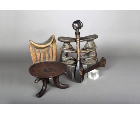 A Kenyan circular stool, with nail decoration and scroll legs, 13.5cm high, a Congolese axe, wood, horn and iron, with head f
