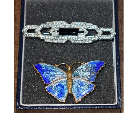 An Art Nouveau enamel butterfly brooch; an Art Deco brooch (2)