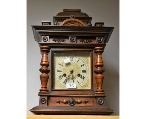 A late 19th century mantel clock, 12cm silvered and engraved dial, with bevelled glass to door,Roman chapter, pierced hands, 