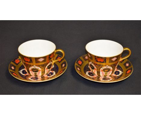 A pair of Royal Crown Derby 1128 pattern breakfast cups and saucers, solid gold band, first quality, boxed (2)