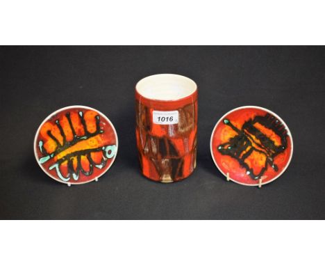 A pair of Poole pottery dishes; a Poole pottery vase (3)