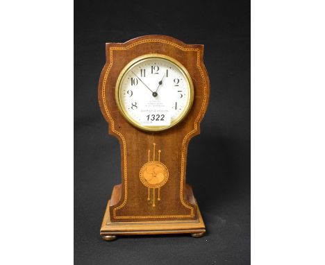 An Art Nouveau inlaid mahogany mantel clock, H Samuel, Manchester, balloon case, cream dial, Arabic numerals, brass bun feet,