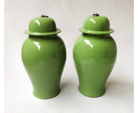 TEMPLE JARS, a pair, Chinese leaf green ceramic ginger jar form, 53cm H. (2)