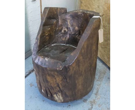 DUG OUT CHAIR, Kubbestol style carved from a single trunk, 87cm H x 65cm x 75cm. (slight faults)