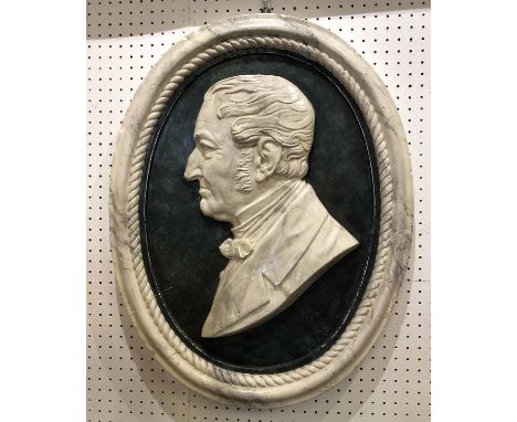 OVAL PORTRAIT MEDALLION OF A GENTLEMAN, 19th century painted plaster, 65cm x 50cm.