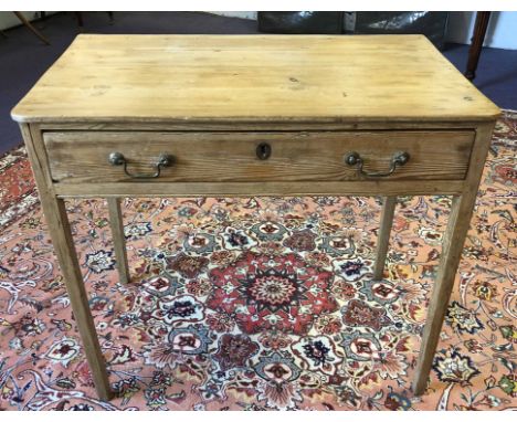 WRITING TABLE, George III pine, circa 1780, having a single frieze drawer above square tapered supports, 79cm H x 87cm x 50cm