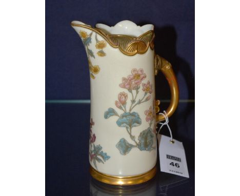 A Royal Worcester blush ivory porcelain jug, decorated with handpainted foliate panels, gilded handle and border, stamped to 