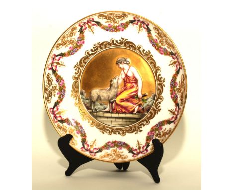 A porcelain circular plate by Naples, decorated with Classical female and sheep to centre, with foliate and enamel gilded pan