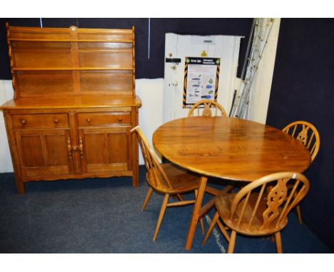 A composite Ercol dining room suite, comprising of dresser, 150cm high x 123cm wide x 45cm deep, drop leaf dining table 71cm 
