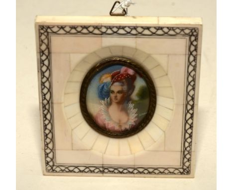 An ivory portrait miniature, indistinctly signed, depicting an 18th century lady, 5cm diameter