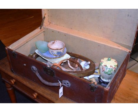 A vintage wood bound travel trunk, 29cm high x 75cm wide, with contents to include antlers, collectors plates etc