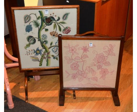 A mahogany firescreen table, with needlepoint floral panel, 81cm high x 52cm wide, together with a similar firescreen, 65cm h