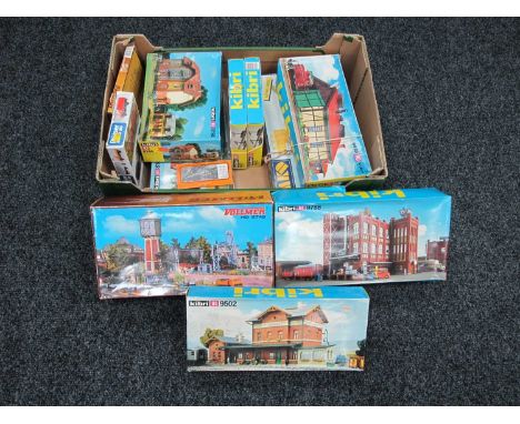 Twelve HO Scale Plastic Model Lineside Buildings and Accessories Kits by Kibri, Vollmer and other, unchecked, boxed.