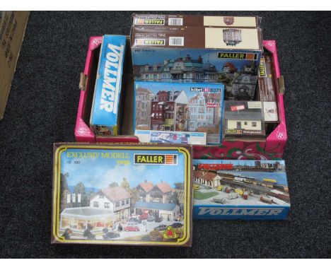 Nine HO Scale Plastic Model Buildings and Lineside Accessories Kits by Faller, Vollmer, Kibri, unchecked, boxed.